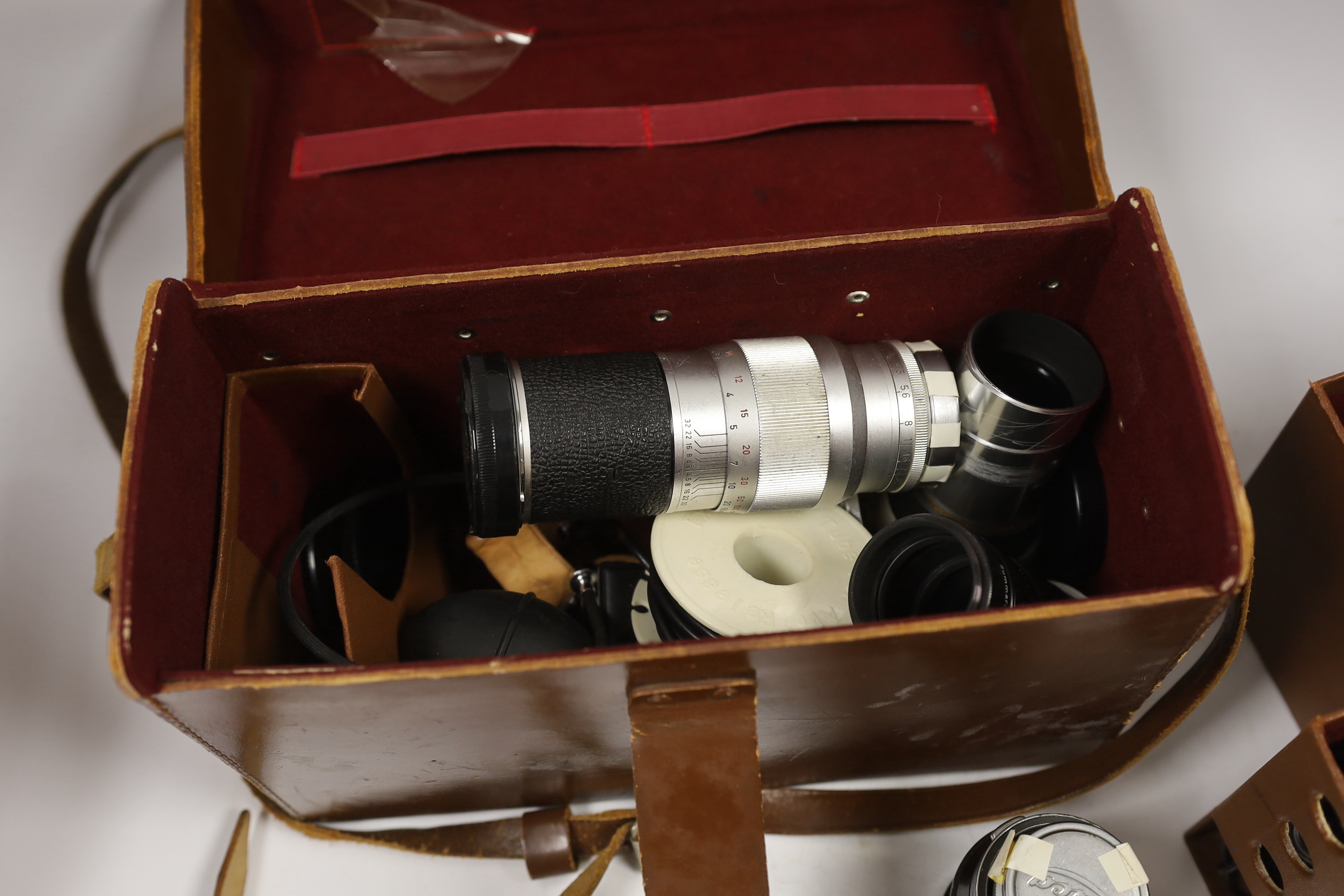 Leica accessories including; a Leitz Visoflex I and Visoflex II, a Summarit f-5cm 1:1.5 lens, an Elmar f=9cm 1:4lens, a Super Angulon 1:4/21 lens, a Range Finder, a Leitz Telyt f=20cm 1:4.5 lens, a Leitz Telyt SFT00 view